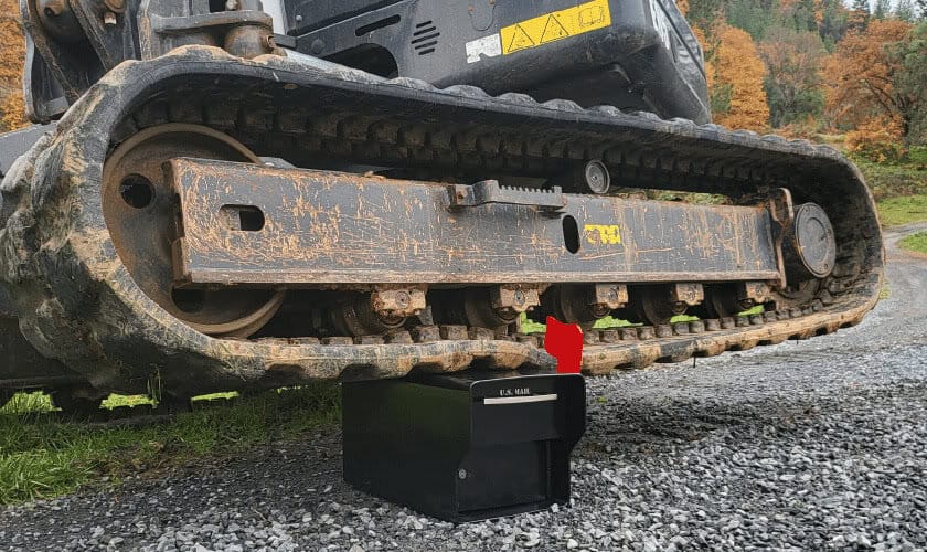Fort Knox Mailbox driven over by a tractor